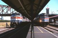 A snapshot in Amtrak history at Union Station, Portland, Oregon, in the summer of 1994. On the left is the <I>Coast Starlight</I> service from Los Angeles to Seattle, while to the right is the Chicago-Denver-Seattle <I>Pioneer</I>. The latter had a relatively short operating life, from 1977 to 1997, but intermediate communities which lost their only passenger train service - such as Laramie, Boise and Baker City - have recently been campaigning for service reinstatement.<br><br>[David Spaven //1994]