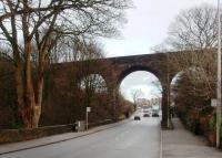 The direct line from Blackburn to Chorley closed to passengers on 4 January 1960 and, almost fifty years later, the viaduct at Feniscowles still spans the A674 main road. This structure and the long embankment from Cherry Tree Junction can be seen from East Lancashire line trains between Pleasington and Cherry Tree station, which is situated immediately beyond the far bend in the road. Map reference SD649358.<br><br>[Mark Bartlett 04/12/2009]