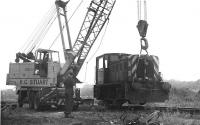 D2720 being placed on the line at Kelso on 26 August 1969 by private contractors involved in track lifting and recovery work on the former route between Kelso Junction and Tweedmouth.<br>
<br><br>[Bruce McCartney 26/08/1969]