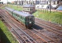 A DMU bound for North Berwick passes Craigentinny signal box in June 1958. <br><br>[A Snapper (Courtesy Bruce McCartney) /06/1958]