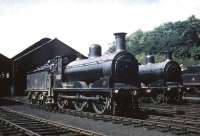 Ex-Caledonian 0-6-0s 57302 and 57623 stand in the shed yard at Dumfries on 13 June 1959.<br>
<br><br>[A Snapper (Courtesy Bruce McCartney) 13/06/1959]