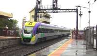 Proof that it does rain in this part of the world, a DMU photographed leaving a wet Kyneton, Victoria, on 3 October 2008 forming a Bendigo to Melbourne service.<br><br>[Colin Miller 03/10/2008]