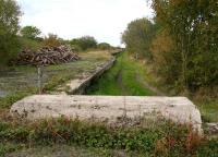 View along the most northerly of the four extra long platforms at Filey Holiday Camp, seen from the buffer stops in October 2009. Arriving trains drew to a halt before the dog-leg allowing the locomotive to run forward onto the parallel engine release line. The same arrangement applied to platform 1 on the south side with the two middle platforms sharing a central release.<br>
<br><br>[John Furnevel 11/10/2009]