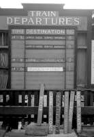 The last ever departure board at Elgin East on Saturday 4th May 1968, announcing the final trains to Aberdeen via the coast, as well as Cairnie Junction via the Craigellachie and Dufftown route. Note the board for 'rail bus to Aviemore' surviving three years after closure! Platforms 5 & 6 refer to the platforms of the adjacent ex-HR Elgin West station. [See image 26833]  <br>
<br><br>[David Spaven 04/05/1968]