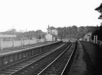 Platform view looking north at Kershopefoot station towards the signal box in the 1960s. The border lies a short distance beyond the level crossing. [See image 27856]<br><br>[Robin Barbour Collection (Courtesy Bruce McCartney) //]