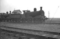Aspinall ex-LYR 3F 0-6-0 no 52252 and classmate photographed at Goole (50D), probably shortly before withdrawal by BR at the end of 1960. In the background is Engine Shed  Junction signal box,  demolished as a result of a locomotive derailment in the 1970s. <br>
<br><br>[Robin Barbour Collection (Courtesy Bruce McCartney) //1960]