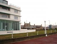 The old Morecambe Promenade station, now known as The Platform concert venue, is seen behind the Midland Hotel in February 2009. This LMS built, recently restored, Art Deco style building dominates the town seafront.<br><br>[Mark Bartlett 14/02/2009]