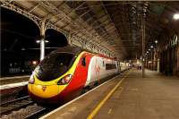 The last Pendolino of the day from Euston to Glasgow pauses at platform 3 at Preston on 26 November 2009. 390037 is the unit in question.<br><br>[John McIntyre 26/11/2009]