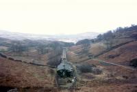 Looking south over the lower portal of Moelwyn Tunnel. The incline on the right was the original route before this tunnel was bored - the new (1970's) route runs roughly parallel into the new tunnel<br><br>[John Thorn /05/1970]