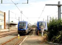 A pair of SNCF DMUs standing alongside St Rochelle station in September 2009.<br><br>[Peter Todd 09/09/2009]