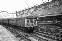 Although displaying Hamilton Circle on the destination blind, Class 311 unit 094 is actually arriving at Glasgow Central in March 1974.<br><br>[John McIntyre /03/1974]