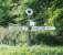 We went looking for bits of this railway which hadn't had the A34 built over them. This road sign to Burghclere station - still pointing the way some 43 years after closure - was a big clue.<br><br>[Ken Strachan 13/09/2009]