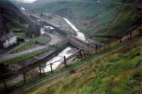 A Sheffield-bound train passes the closed Woodhead station at the  western end of Woodhead Tunnel in September 1966.<br><br>[John Thorn /09/1966]