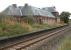 Closed to passengers in 1960, Brotton once handled trains on the Yorkshire coast line betweeen Teesside and Whitby. The old station and its adjoining yard are now used as a tyre and exhaust centre with the station house a private residence. The line has been singled and relaid on a new alignment through the old station and nowadays sees considerable freight traffic in the form of potash from Boulby and steel from Skinningrove.<br><br>[John Furnevel 13/10/2009]