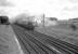 S15 30499 passes Winchfield, Hampshire, in 1960 with a westbound freight.<br><br>[John Thorn //1960]