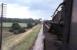 The second photo from my cab ride from Red Scar sidings at Ribbleton (on the Longridge branch) to Lostock Hall on Black 5 4-6-0 44874 [see image 24975]. This picture is on the now closed East Lancashire lines from Preston out to Todd Lane Junction where the train took the chord round to Lostock Hall. The Whitehouse Junctions formed a triangle between this line and the Southport line. That line had closed in 1964 and this followed in 1972 when East Lancashire line trains were diverted via Farington Curve Junction. Even though this is the last weekday of steam working another steam hauled coal train is approaching on the opposite line, possibly heading for Fleetwood Power Station. Penwortham Gas Works, then also rail served, can be seen on the skyline. <br><br>[David Hindle 02/08/1968]