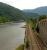 View south from the Ponte della Maddalena at Borgo a Mozzano, Tuscany, showing the Lucca - Aulla line running along the west bank of the River Serchio.<br><br>[Iain Steel 07/08/2007]