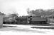 Ivatt 2-6-0 no 43049 shunts in the snow at Langholm in the mid 1960s.<br><br>[Robin Barbour Collection (Courtesy Bruce McCartney) //]