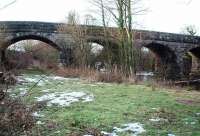 This interesting five arch bridge spans the trackbed, and the River Wenning, a short distance to the west of Wennington station on the old direct line to Lancaster. View towards Hornby at Map Reference SD610693. <br><br>[Mark Bartlett 31/12/2009]