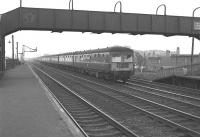 The 7pm Inter-City DMU to Ayr on the down fast passing Hillington West in August 1963.<br><br>[Colin Miller /08/1963]