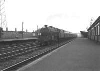 An up special runs through Hillington West in August 1963 behind an unidentified Black 5.<br>
<br><br>[Colin Miller /08/1963]