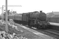 Stanier Black 5 no 45357 runs into Paisley Gilmour Street with an extra for Ayr in June 1966, passing the electrification works.<br>
<br><br>[Colin Miller /06/1966]