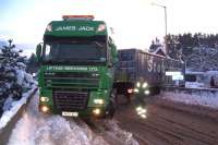 Carrbridge clearup 2. Articulated lorry with recovered container having problems negotiating the junction on Station Road on 7 January 2010, with traffic halted for a good 30 minutes. [With thanks to Gus Carnegie] <br><br>[Andrew Kirk 07/01/2010]