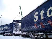 Following the derailment at Carrbridge on 4 January 2010, removal of the Stobart containers is currently taking place. The photograph shows lifting operations underway on the morning of 9 January - see latest news item.<br><br>[Gus Carnegie 09/01/2010]
