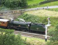 Ex-SR <I>Schools</I> class 4-4-0 no 30926 <I>Repton</I> drifts into Goathland in July 2007 with a train for Whitby. <br><br>[Bruce McCartney 09/07/2007]