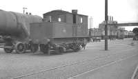 A locomotive that spent much of its working life at Boston sleeper depot, BR departmental Sentinel locomotive no 7 (ex-Y3 68166), stands in the yard at Doncaster Works. The photograph is thought to have been taken during a works visit in 1961, some three years prior to its final visit for cutting up.<br><br>[K A Gray //1961]