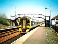 With all the problems on the Highland Main Line in the past couple of weeks caused by the severe weather it's nice to be reminded that other seasons are available.  On a beautiful 13 May 1998, unit 158 716 calls at Dalwhinnie with a southbound service.<br><br>[David Panton 13/05/1998]