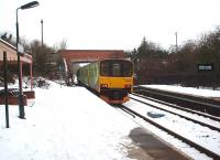 A Stratford-upon-Avon to Stourbridge Junction service, formed by 150005, leaves Wilmcote on 12 January. Immediately north of here is semaphore controlled Bearley Junction, where the Hatton line diverges, but this train will take the Henley-in-Arden line to Birmingham. <br><br>[Mark Bartlett 12/01/2010]