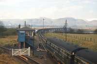 Last day of service at Throsk station (just out of sight to the right) in April 1966, latterly the only intermediate station on the Larbert-Alloa line. The signalman hands over the token for the single-track section over the bridge across the Forth (with its central swing section just visible). Passenger services continued over the bridge until 1968, with freight trains from Larbert to the Bandeath military depot (private siding connection at the bottom left) surviving until 1978.<br><br>[Frank Spaven Collection (Courtesy David Spaven) /04/1966]