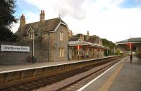 The main building at Grange-over-Sands on 4th October 2006. No train... it was too horrible to take when it eventually came - a hideous yellow thing like a couple of 4-wheel buses joined together!<br>
<br><br>[Colin Miller 04/10/2006]