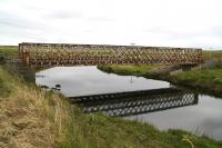 View south along the River Thurso south west of the village of Halkirk, Caithness, on 28 August 2007, showing the lattice girder bridge that carries the Far north line across the river.<br><br>[John Furnevel 28/08/2007]