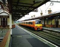 320 302 with an eastbound service at Dumbarton Central on 17 Jul 1997<br><br>[David Panton 17/07/1997]