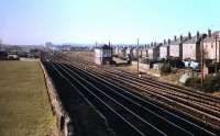 A general view west over a <I>remodelled</I> Saughton Junction in 1975 showing the abandoned signal box, with the site of the former carriage sidings beyond.<br><br>[Neil McWilliam //1975]