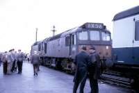 <i>Grand Scottish Tour no 2</i> stands at Stranraer Harbour on 27 May 1967 following the trip down from Ayr. Locomotives D7612+D7614 are in the process of running round the train in preparation for the return journey. Meantime, one or two well known faces on the railway scene in those days pass the time of day. In fact, isn't that .... <br><br>[Colin Miller 27/05/1967]