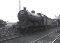 Ex-LNER class J20 0-6-0 no 64699 on shed at 31B March in July 1963, with one of the 'new order' (D6745) making an appearance in the left background.<br><br>[David Pesterfield 07/07/1963]