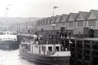 Looking landward from the River Clyde alongside Gourock station in 1967 with <I>Countess of Breadalbane</I> berthed in the foreground.<br><br>[Colin Miller //1967]