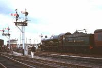 An Ian Allan Railtour from Paddington headed by 4079 <I>Pendennis Castle</I> stands at the east end of Swindon station in August 1965 prior to commencing the journey home. The railtour had arrived at Swindon via Worcester Shrub Hill [see image 21931].<br><br>[Robin Barbour Collection (Courtesy Bruce McCartney) 08/08/1965]