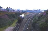 A Class 08 eases a Waterloo-Guild Street trip towards the main line connection at Kittybrewster in 1995.<br>
<br><br>[David Spaven //1995]