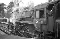 The LCGB <I>Hampshire Branch Lines Railtour</I> of 9th April 1967 from Waterloo utilised ten different steam locomotives over the course of the day. The photograph shows BR Standard class 4 2-6-0 no 76031 about to leave Ascot with the Aldershot leg of the tour.<br><br>[Robin Barbour Collection (Courtesy Bruce McCartney) 09/04/1967]
