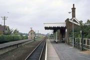 The rural tranquility at Worstead on the Norwich to Cromer and Sheringham line is shattered by the roar of a McDonnell-Douglas F4 Phantom jet on exercise (visible top left). The date is September 30th 1977.<br><br>[Mark Dufton 30/09/1977]