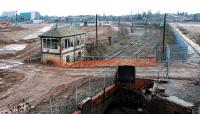 We made cars here once, not so long ago. This view looks east towards the mainline over the stub of the former Longbridge - Old Hill line. The Longbridge Plant existed on both sides of the line and across the A38 behind the camera. Only the South Works remained standing on this visit (out of shot off to the right), hopefully to be used by Shanghai Automotive Industry Corporation in the future. The signalbox formerly controlled sidings used by the works and, longer ago, the line through Longbridge (2nd) station. Longbridge (1st and 3rd) station is out of sight in the centre distance. Latterly the signalbox rejoiced in the name <i>Longbridge East Shunt Frame</i>. There has been discussion of re-opening the line from Longbridge to Frankley to aid regeneration.<br><br>[Ewan Crawford 29/01/2010]