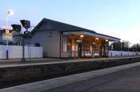 Inverkeithing station in its current form dates from the opening of the Forth Bridge in 1890 when Dalmeny and North Queensferry were also opened. Happily all three stations retain an original building and in the case of Inverkeithing it's the Up waiting room. In the middle of the room there's what looks like an oversized rectangular pillar which was once the fireplace and chimney though as can be seen the chimney top has long gone.<br><br>[David Panton 30/01/2010]