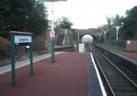 The cramped layout at the eastern end of Ulverston station can be seen here, as can a curious short platform at the foot of the disused steps leading to the former goods depot and early passenger terminus [See image 22211]. Any information on the purpose of this platform would be appreciated. <br><br>[Mark Bartlett 30/01/2010]