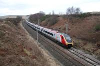 This Pendolino has a somewhat toothy grin with the front cover removed. The view looks north towards Scout Green.<br><br>[Ewan Crawford 28/01/2010]