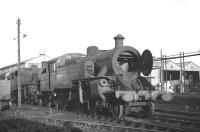 Scene on shed at Belfast York Road in December 1969. Although this LMS Derby built 2-6-4T looks to be out of use, some of its classmates were still active at that time working spoil trains from near Larne to Belfast in connection with construction of the M2 motorway. This traffic ceased in the summer of 1970.<br><br>[Bill Jamieson 06/12/1969]
