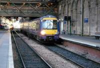 170 394 forms the 1637 service to Dunblane standing at Waverley platform 10 on 7 October 2009.<br><br>[Colin Miller 07/10/2009]